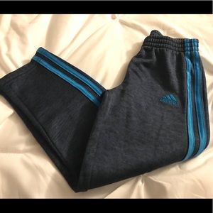Heathered navy and blue stripe Adidas pants.